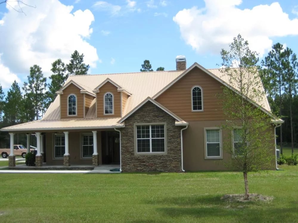 Tan House with Metal Roof